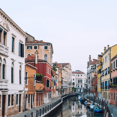 Walk just ten minutes along a picturesque waterway to the Piazza San Marco