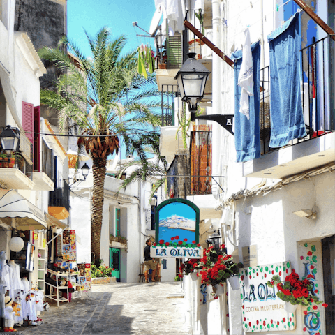 Explore Ibiza Town, a fifteen-minute drive away