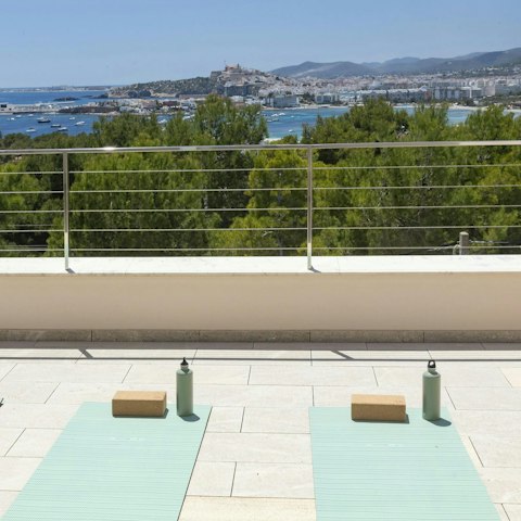 Feel zen with some outdoor yoga backdropped by views