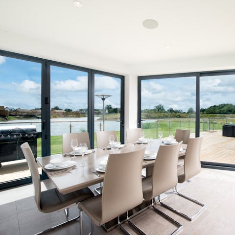 Dine with sweeping views across the lake