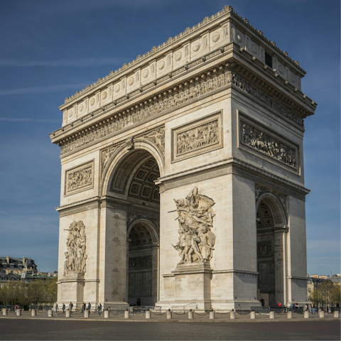 Stroll along the Champs-Élysées to the Arc de Triomphe
