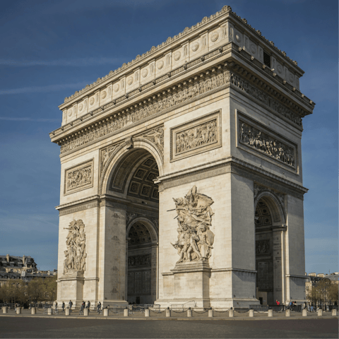 Stroll along the Champs-Élysées to the Arc de Triomphe
