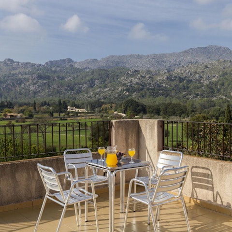 Enjoy beautiful views across the valley while relaxing on the terrace