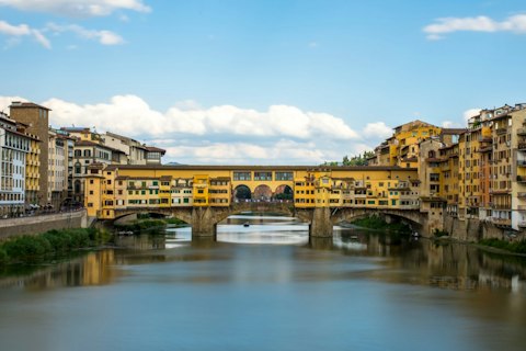 Enjoy a scenic riverside stroll along the Arno, a short walk away