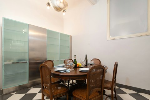 Gather around the antique round table for a long Italian dinner
