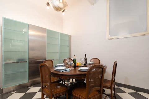Gather around the antique round table for a long Italian dinner