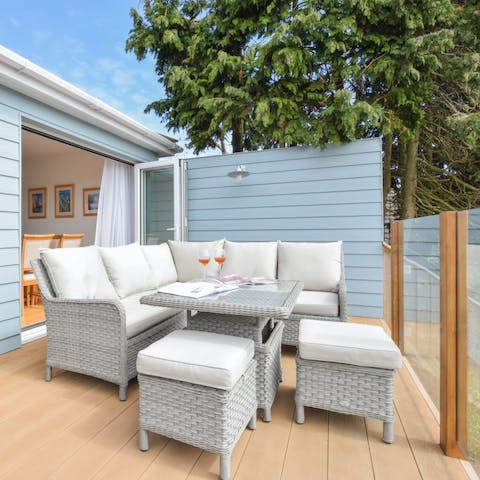 Sip a glass of wine in the sun on the upper terrace