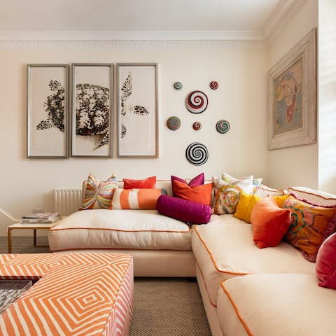 Curl up with a good book in the colourful living room