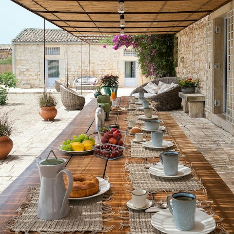 Enjoy delicious Italian feasts on the shaded terrace