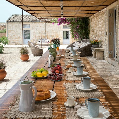 Enjoy delicious Italian feasts on the shaded terrace