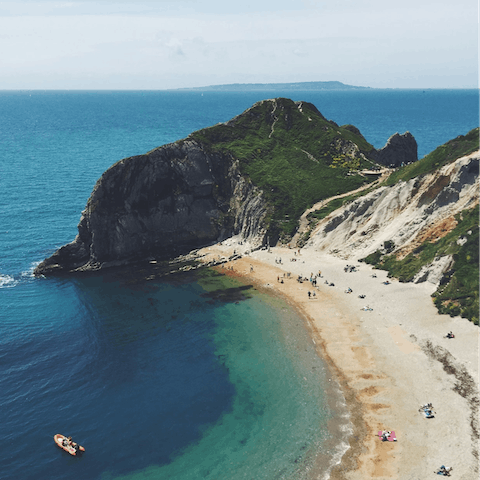 Pack up a beach bag for a day along the Jurassic Coast, just a short drive away