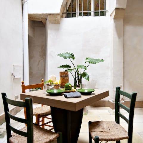 Enjoy an alfresco breakfast in the pretty private courtyard