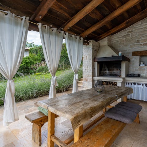 Fire up the barbecue and dine alfresco in the outdoor kitchen