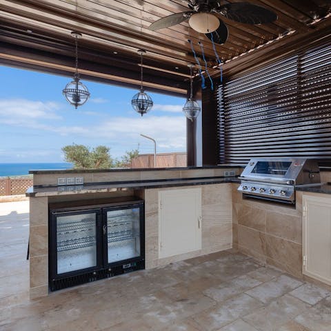 Whip up a batch of cocktails or a full family feast in the outdoor kitchen