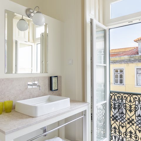 Look out over old city streets from balcony windows throughout the home