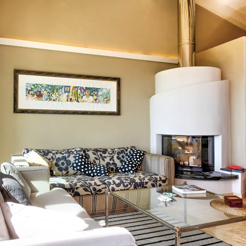 Enjoy a glass of wine by the fire on cooler nights