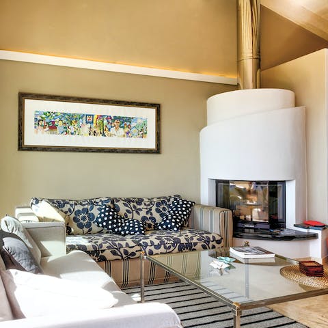 Enjoy a glass of wine by the fire on cooler nights