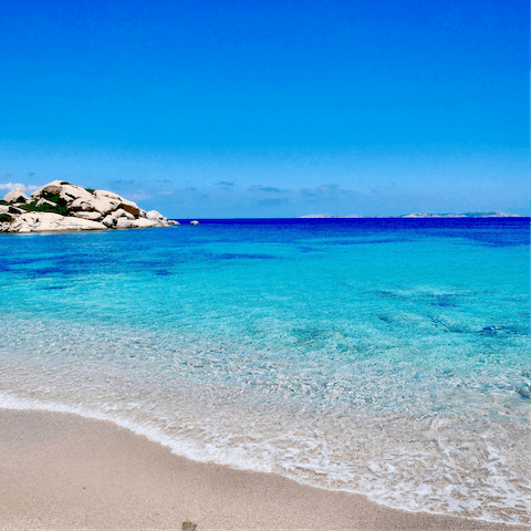 Take a short stroll down to Torre delle Stelle's sandy beach