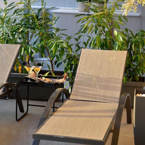 Stretch out in the sun on the balcony