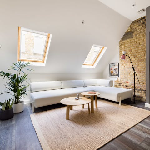 Sprawl out on the huge corner sofa and plan the day ahead