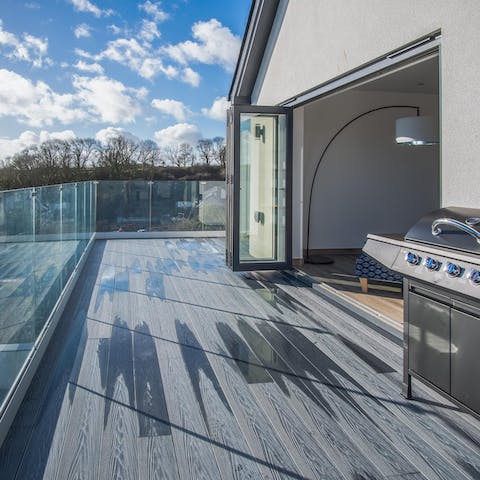 Come together for sunset barbecues on the vast veranda