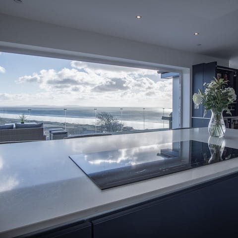 Flex your culinary muscles in the chef-worthy kitchen – there’s two Smeg ovens at the ready, and this view