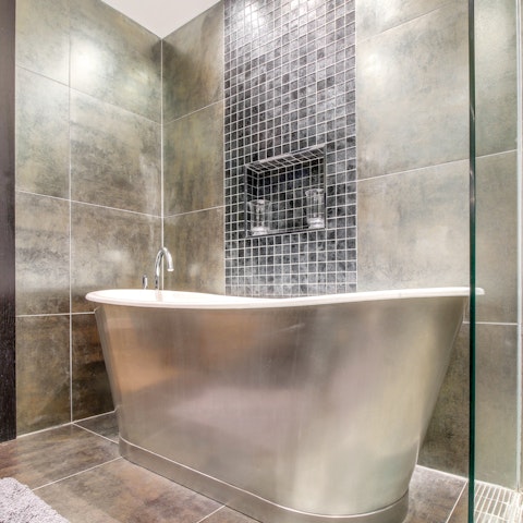 Run a bath and soak your troubles away in this freestanding tub