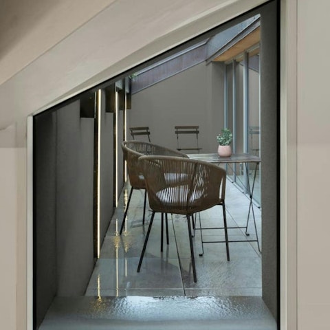 Sit back with a drink on the private balcony