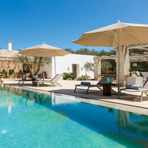 Hit reset beside the infinity pool fringed by acres of olive groves