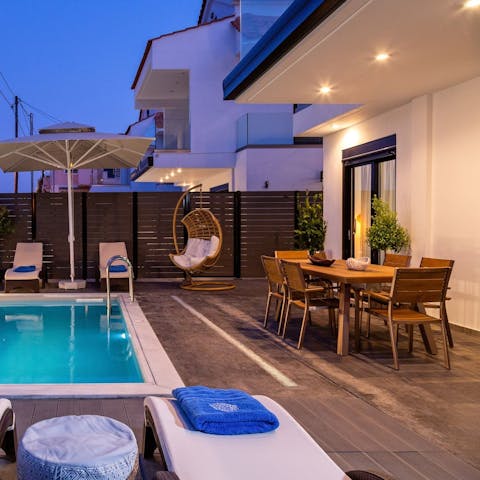 Serve up cocktails on the terrace after an evening swim