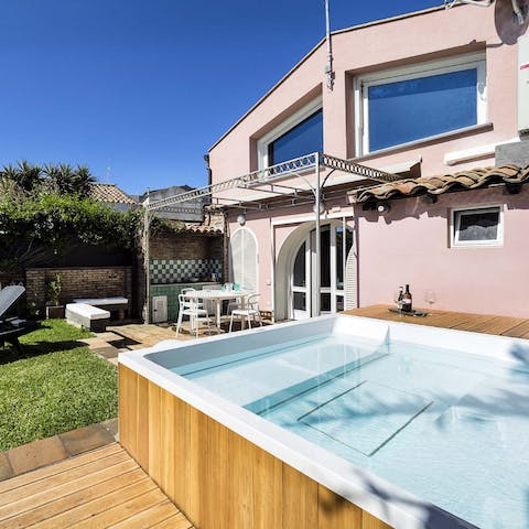 Lay back and relax in the Jacuzzi as you sip sundowners