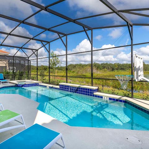 Take a moment to relax and enjoy a refreshing dip in the pool