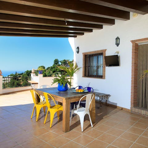 Enjoy cocktails on the shaded patio