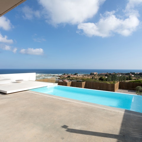 Enjoy sea views from the heated saltwater pool