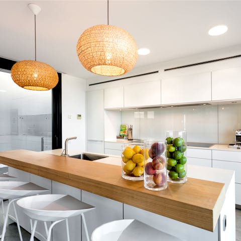 Cook meals in the sleek kitchen