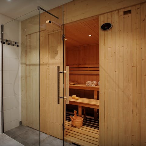 Soothe tired muscles in the private sauna after a day of outdoor adventures