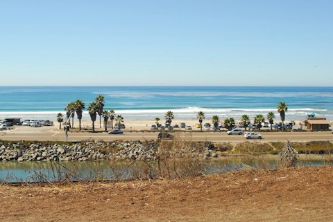 Surf or sunbathe at Cardiff State Beach, a short drive away