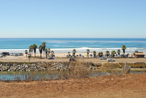 Surf or sunbathe at Cardiff State Beach, a short drive away