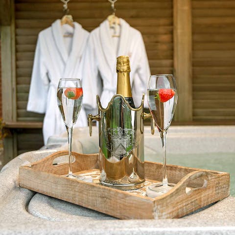 Enjoy the complimentary bottle of Prosecco and strawberries