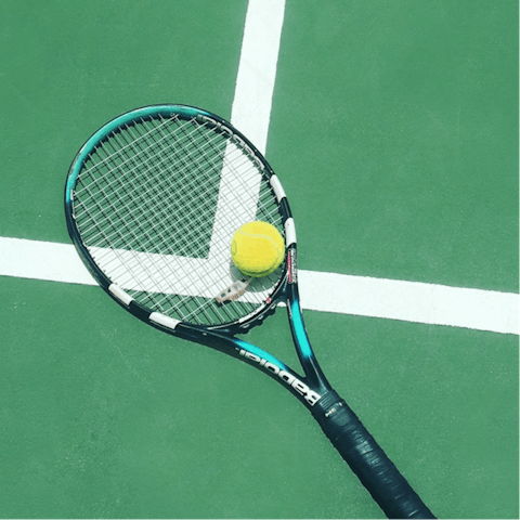 Pack your racquet and make the most of the private tennis court
