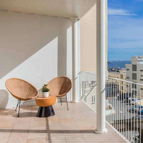 Kick back on the balcony with a glass of Vinho Verde