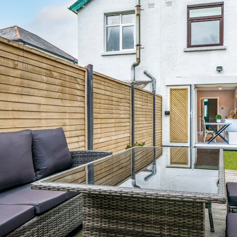 Kick back after an action-packed day in the home's garden