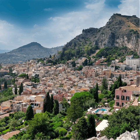 Hop in the car and make the 3km drive up the to the mountainside town of Taormina