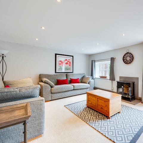 Get the gang together and get cosy in front of the feature fireplace