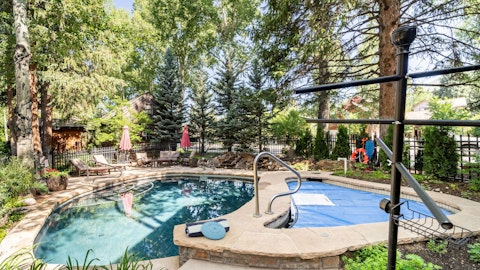 Cool off in the tree-lined shared pool after a day on the mountain