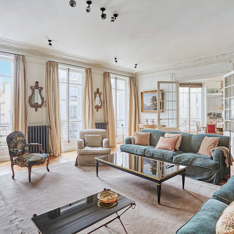 Enjoy views of Parisian streets from the lounge