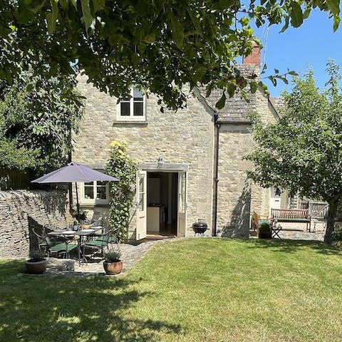 Fire up the barbecue in the suntrap, private garden