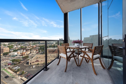 Pad out the balcony with a glass of wine