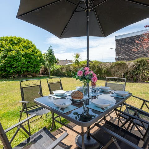 Enjoy relaxed alfresco feasts in the large garden