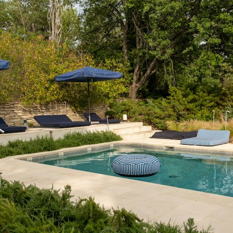 Experience peace and relaxation while lounging by the pool